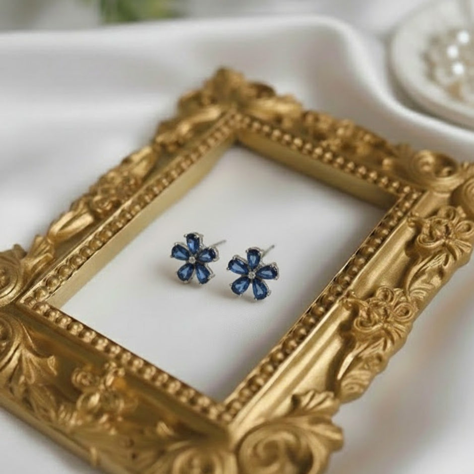 BOTOLO Boucle d'oreille en forme de fleur topaze london argent