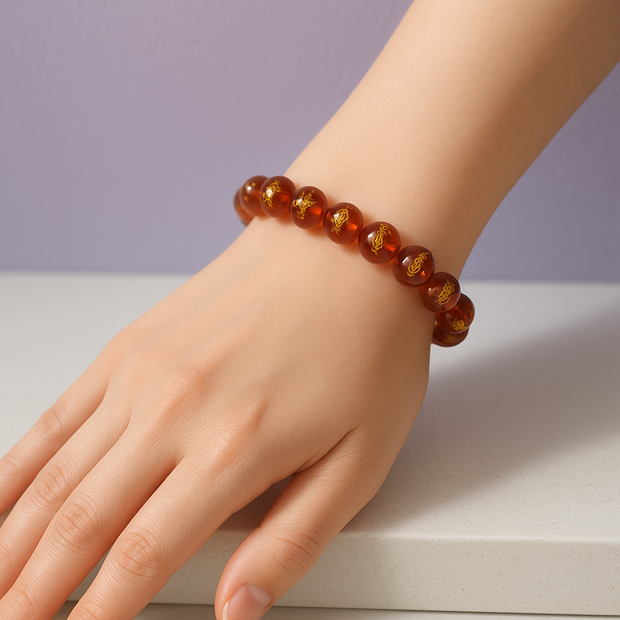 CALOBRA Bracelet calcite orange gravé doré